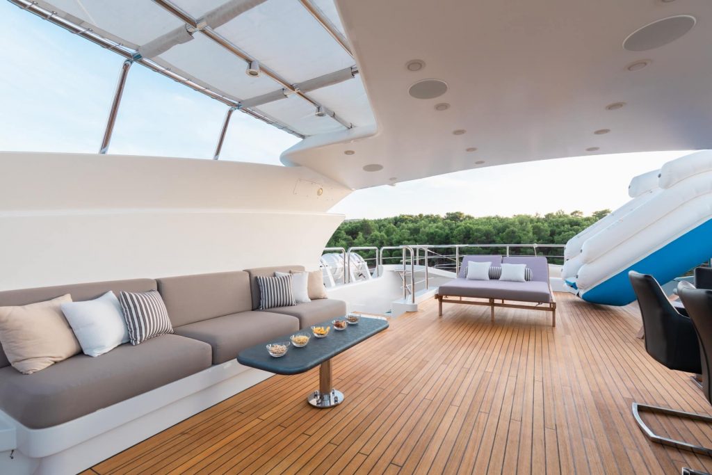 africa I yacht charter main deck with sofas and a coffee table