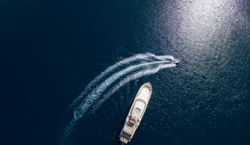 jet ski cruising around the yacht imagine