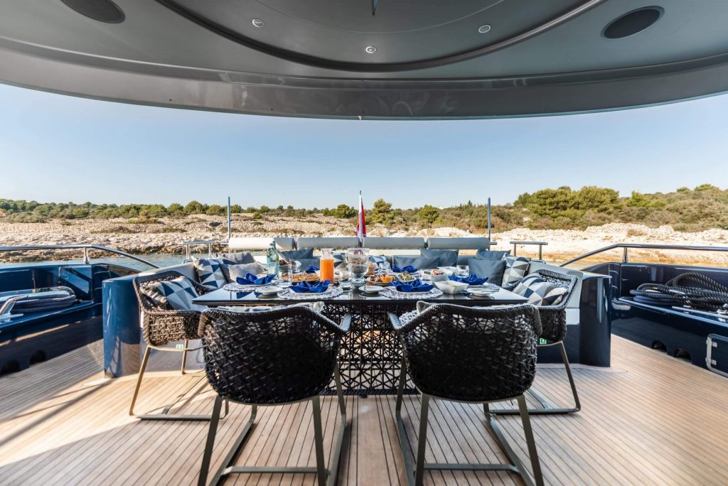 one blue yacht charter dining table