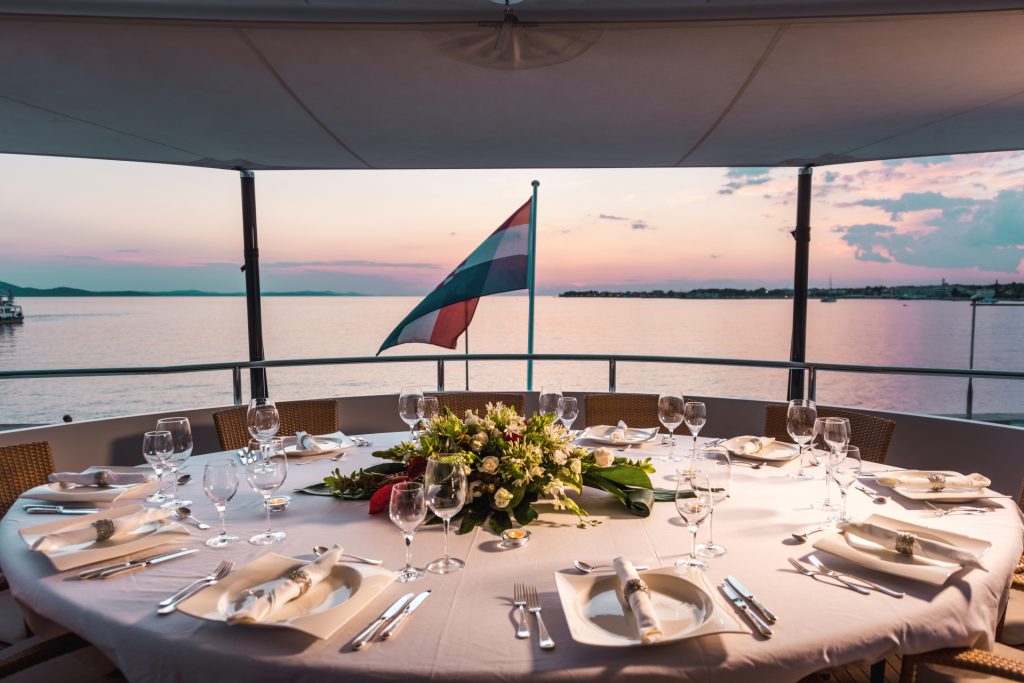 agram yacht charter outdoor dining setup