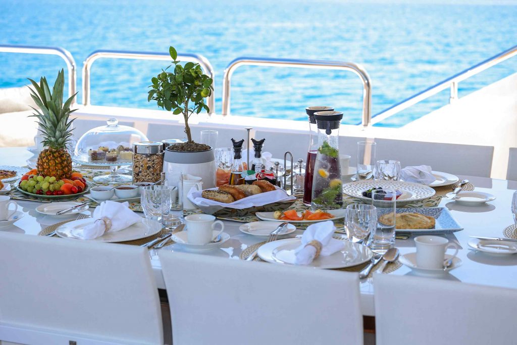 Alalya Yacht Charter bridge deck served dining table