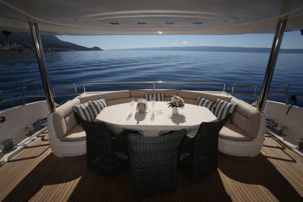 baby i yacht charter aft deck dining table