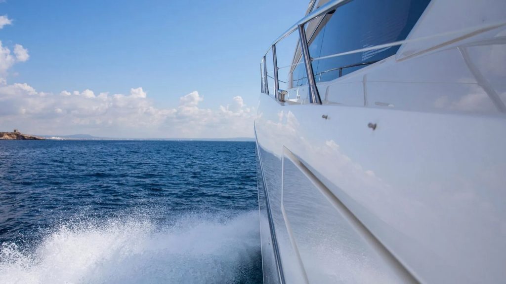 Cardano yacht charter cruising side view