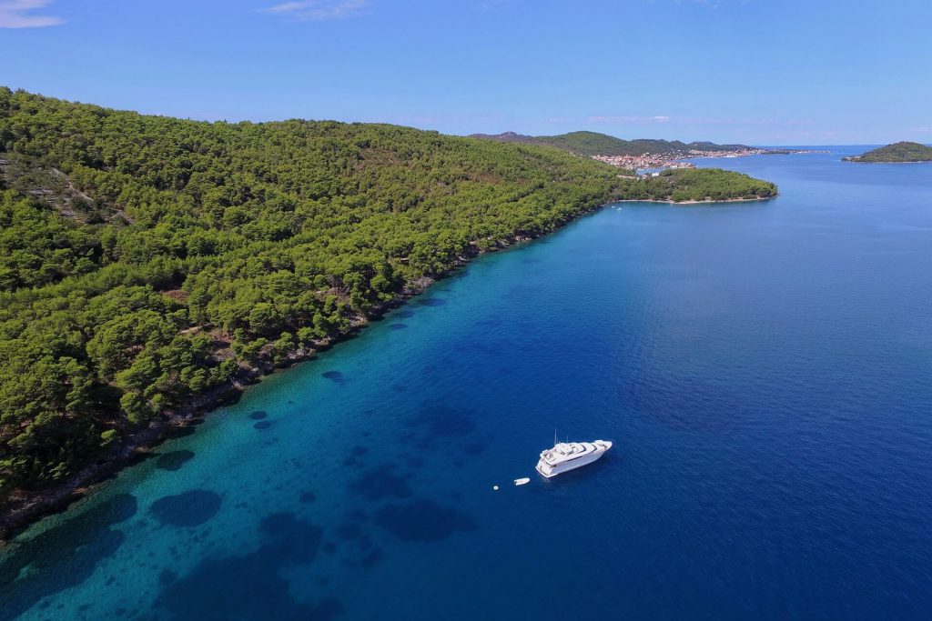 lady marcelle yacht charter anchored in a bay