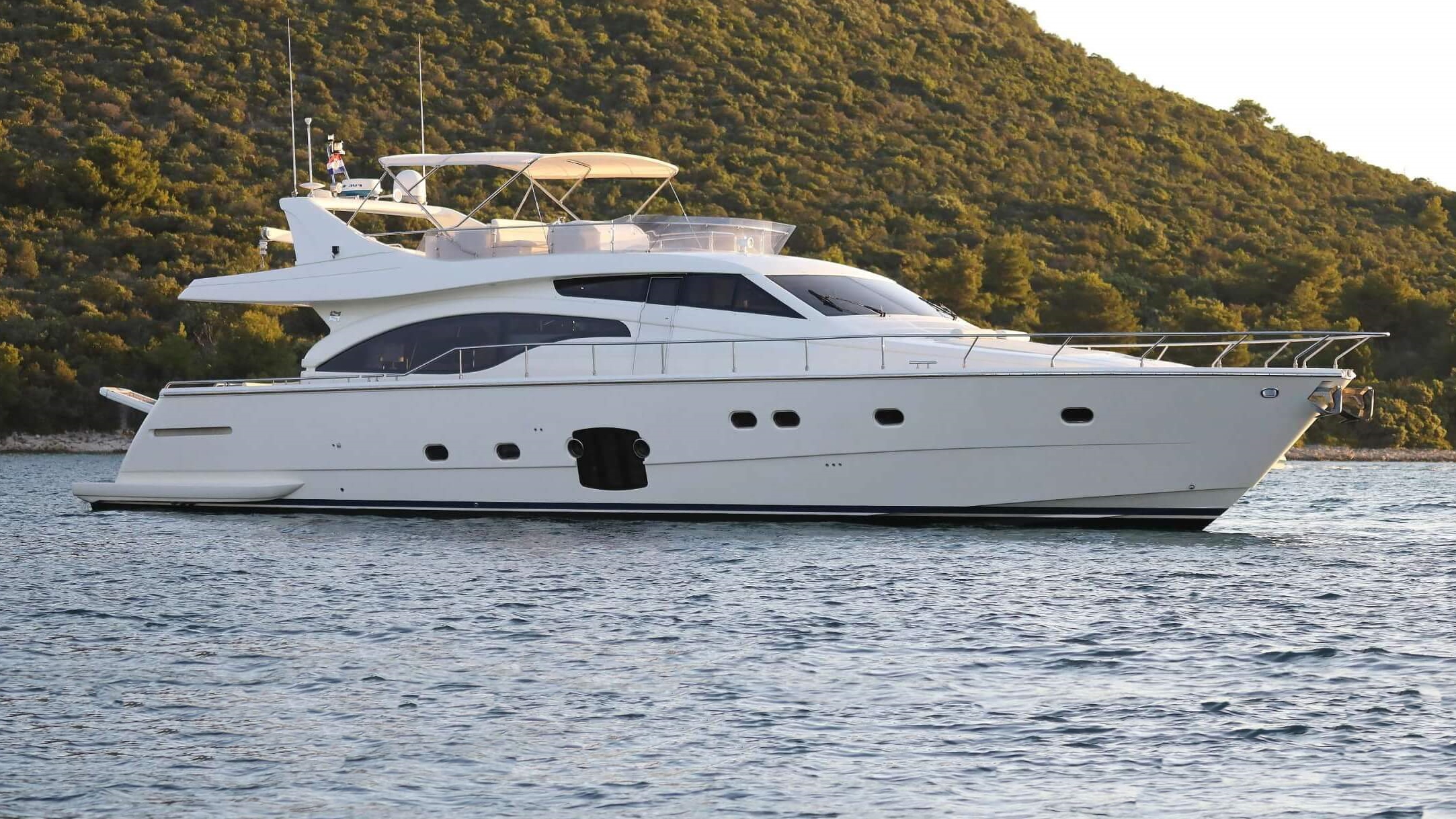 dominique yacht charter starboard side view