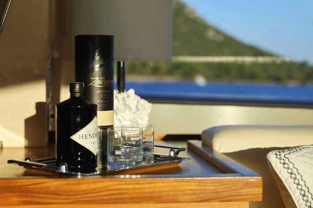 dominique yacht charter drinks on a deck small table