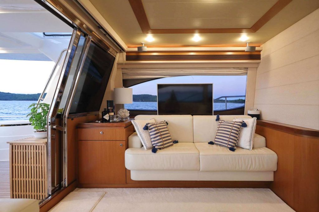 dominique yacht charter sofa and tv view