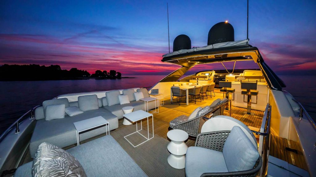 isotta yacht charter sundeck area at sunset