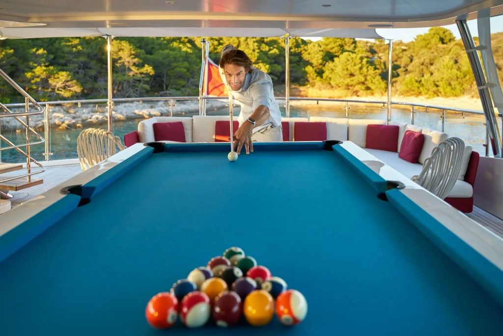 happy me yacht charter playing pool