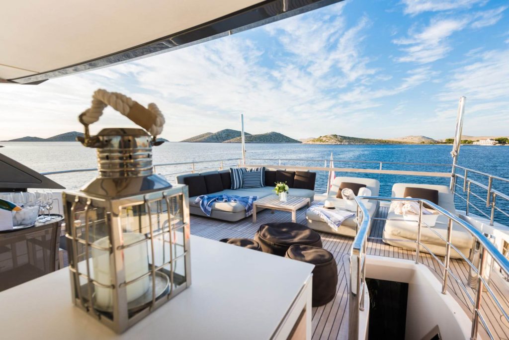 casa yacht charter main deck table