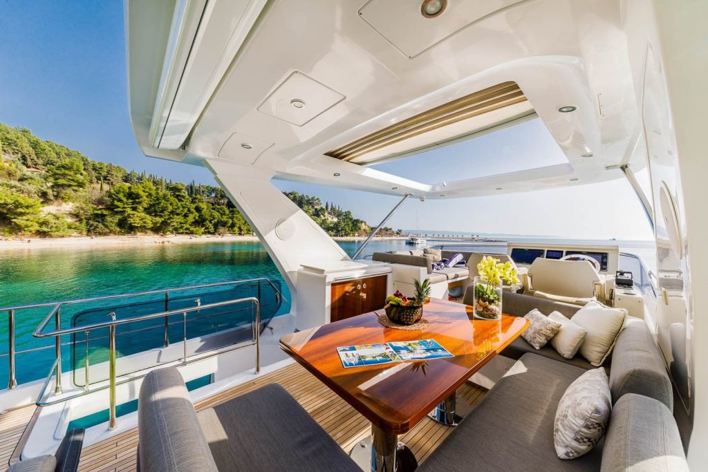 karat II yacht charter alfresco table relaxing area