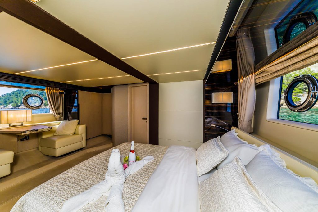 karat II yacht charter master cabin with a view on a large bed