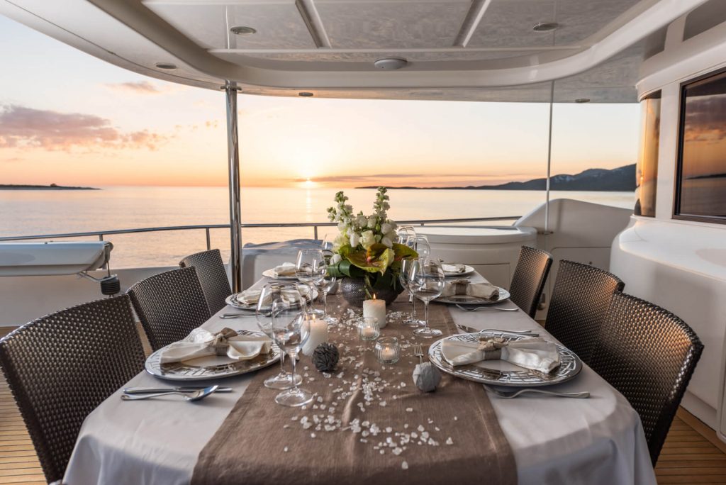 klobuk yacht charter upper deck dining table