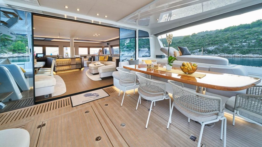 adriatic dragon catamaran yacht main deck with a table