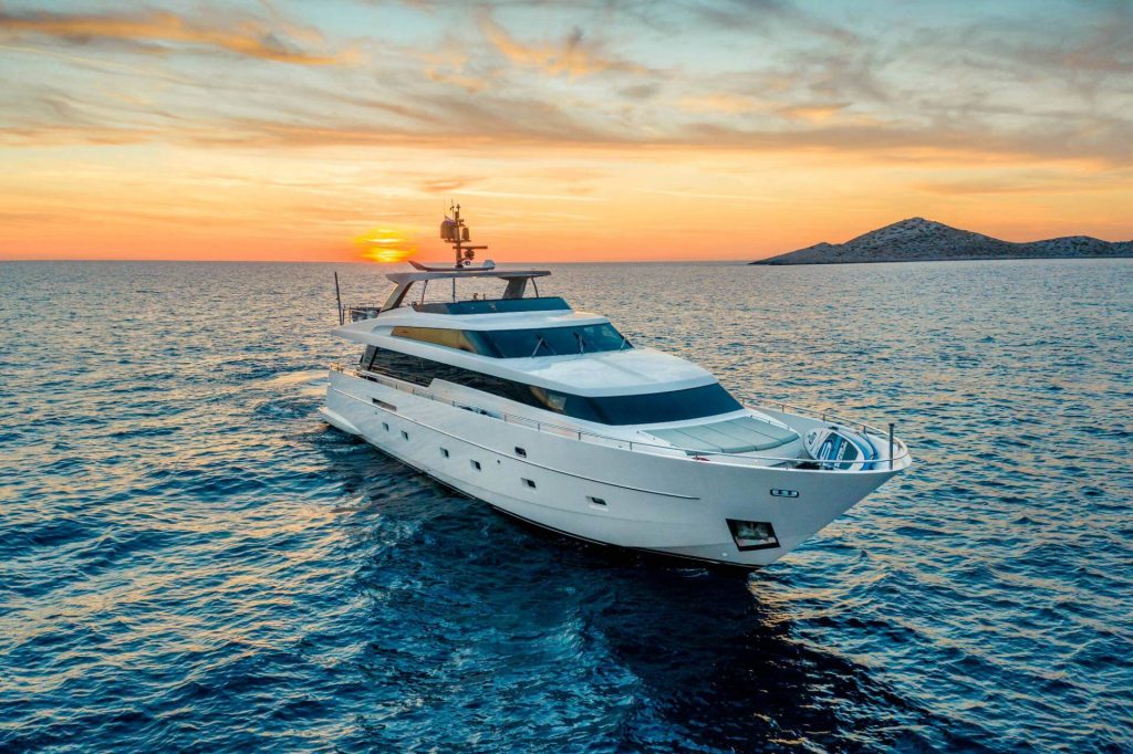 casa yacht charter sailing during sunset