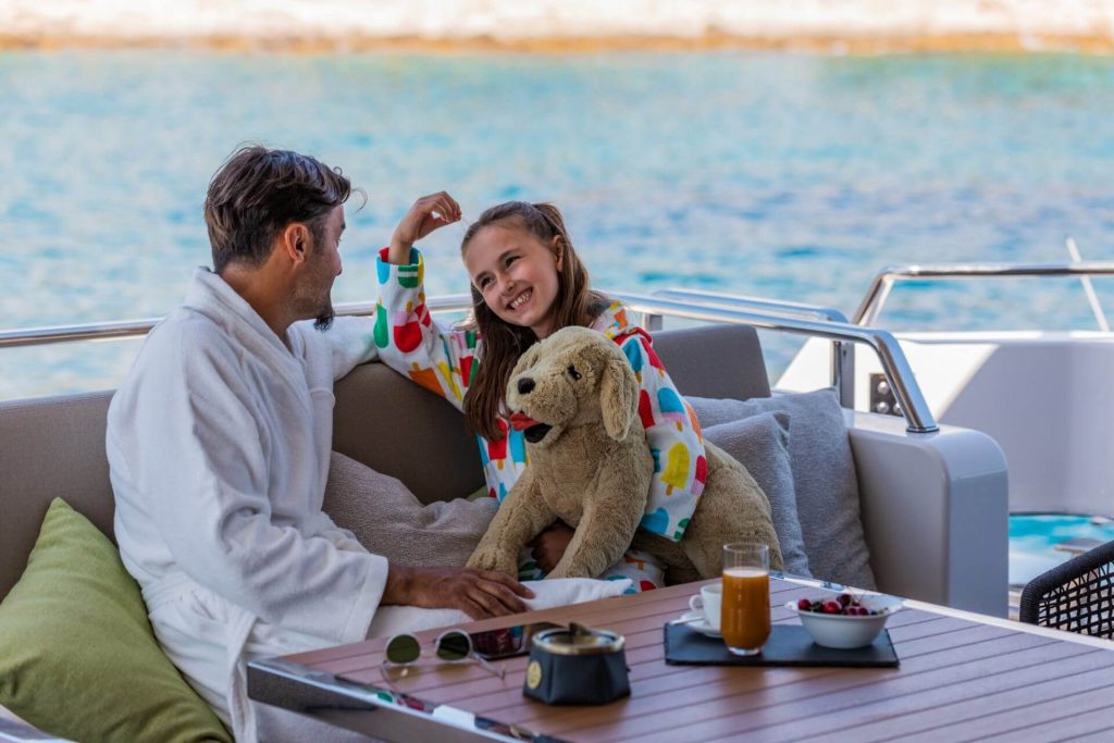 noor II yacht dad and daughter are relaxing