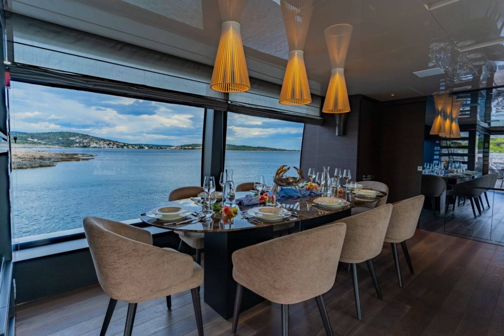 noor II yacht charter dining table
