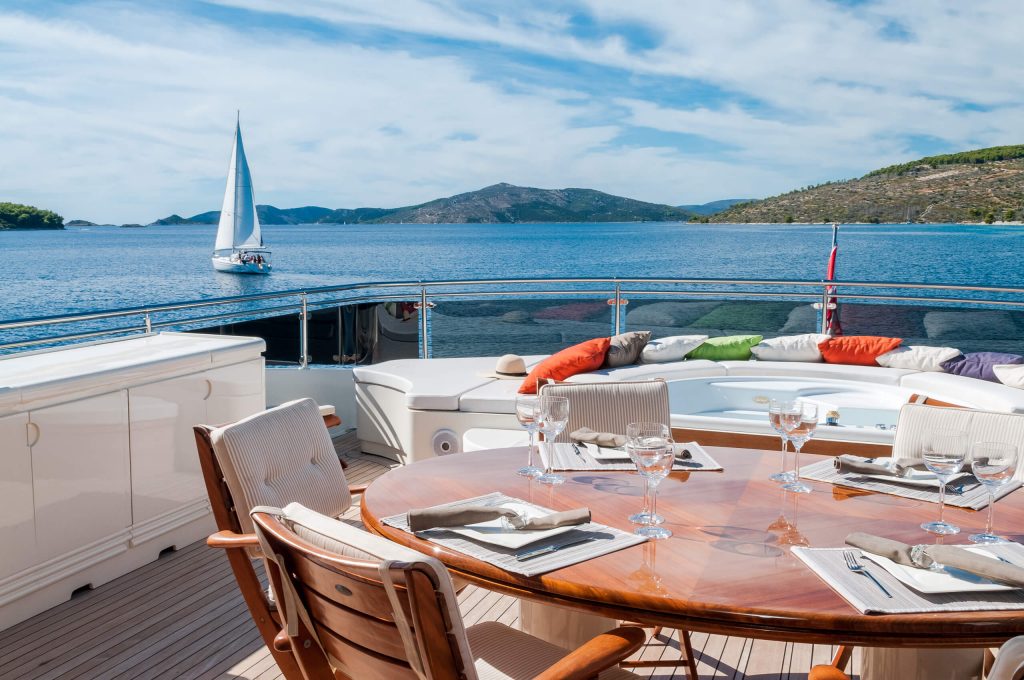 novela yacht charter alfresco dining table