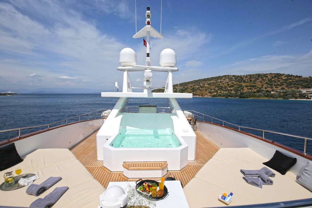 ottawa IV yacht charter main deck with a jacuzzi in the middle