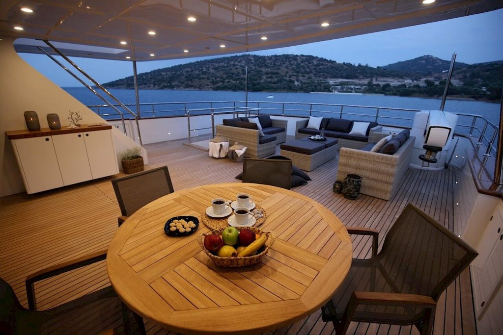 ottawa IV yacht charter aft deck dining table