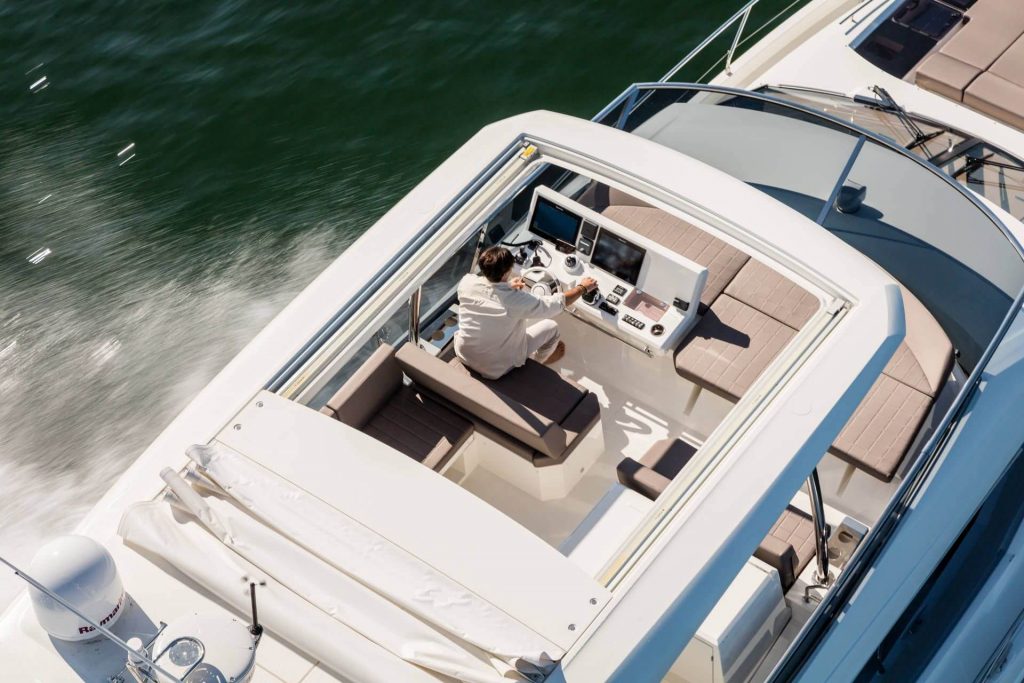 prestige 630 yacht charter speeding in the sea from above