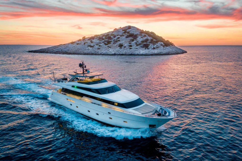 casa yacht charter sailing during sunset