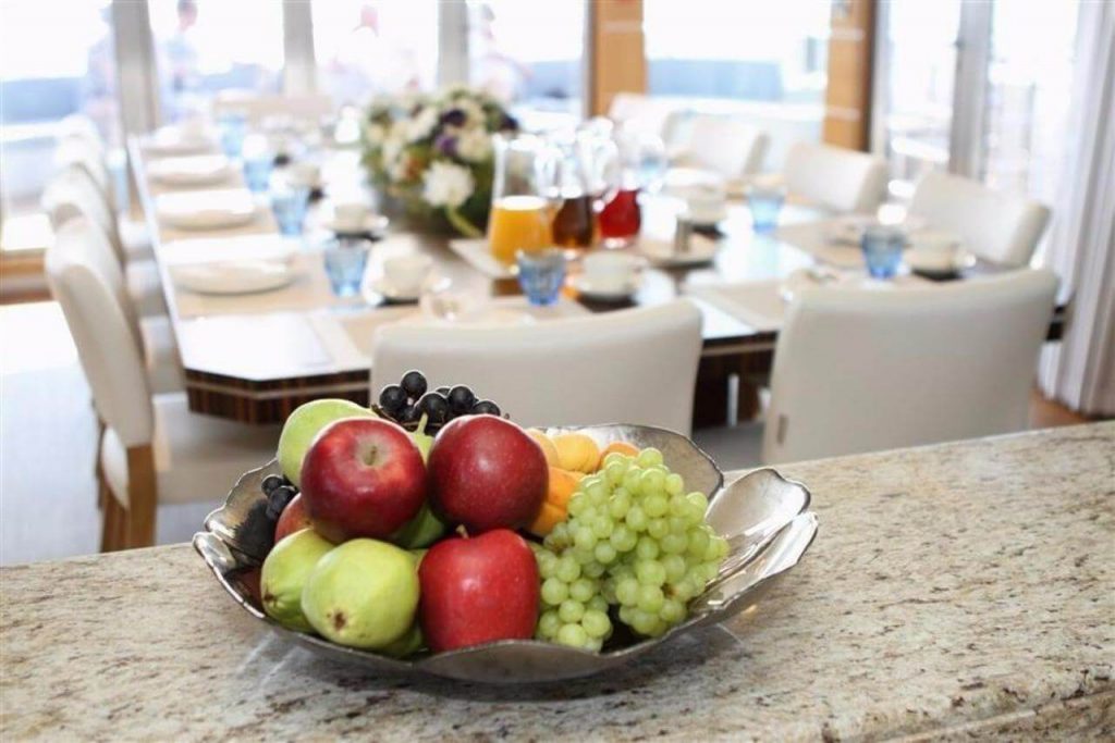 fruit on a table on a quaranta catamaran yacht charter