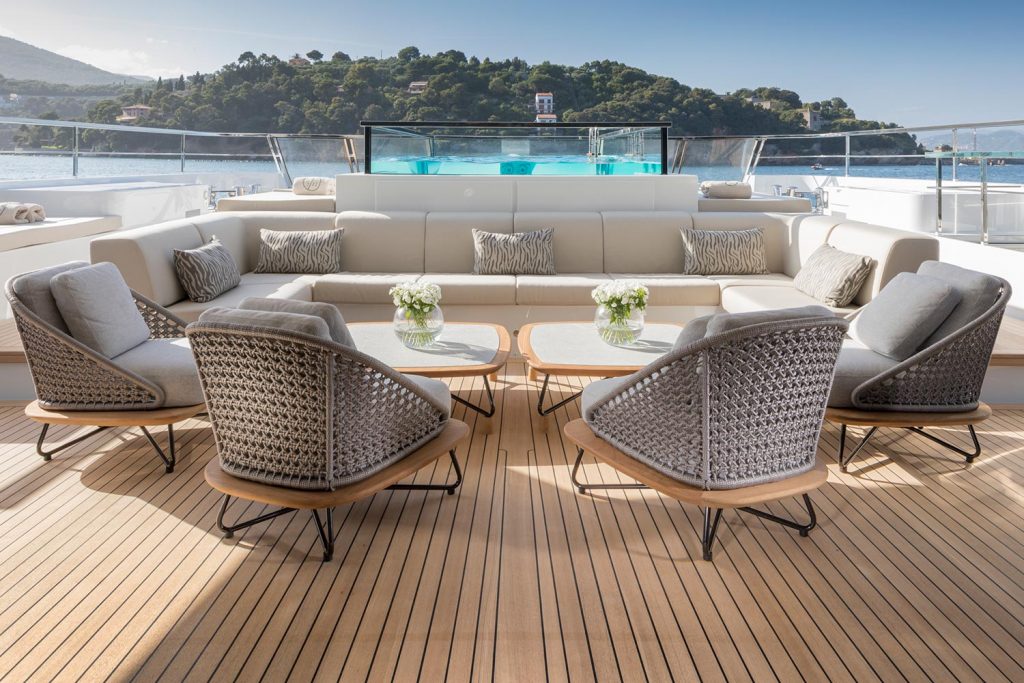 seven sins yacht charter aft deck lounging area