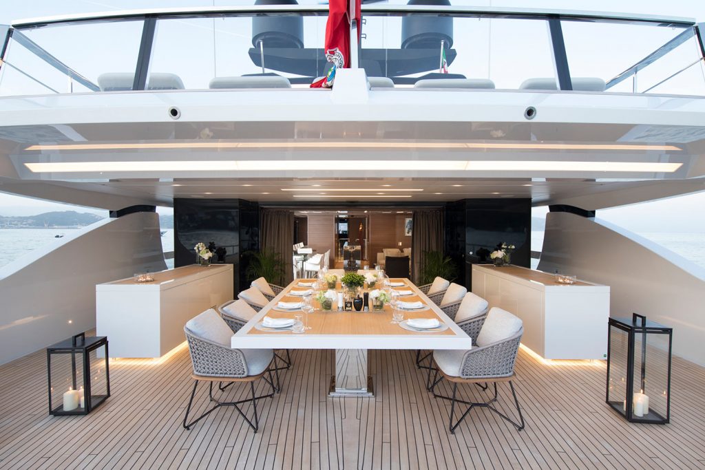 seven sins yacht charter upper deck aft dining area
