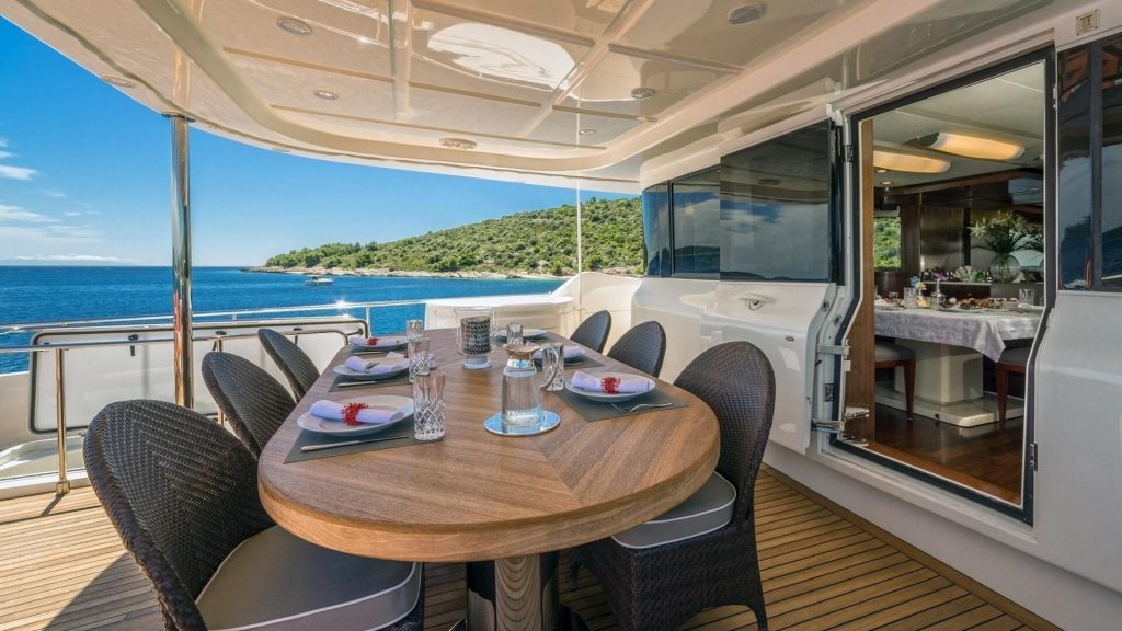 seventh sense yacht charter exterior dining table