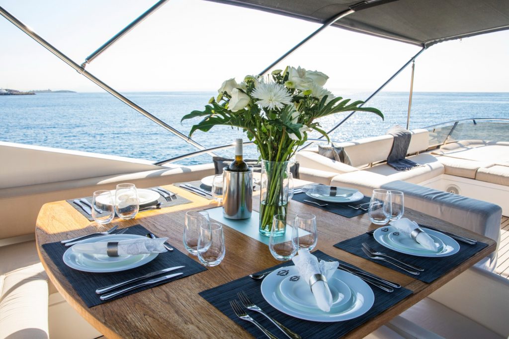 cardano yacht charter dining table