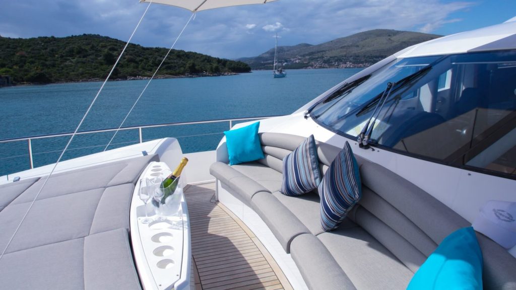 a cloudy bay yacht charter sunbathing area