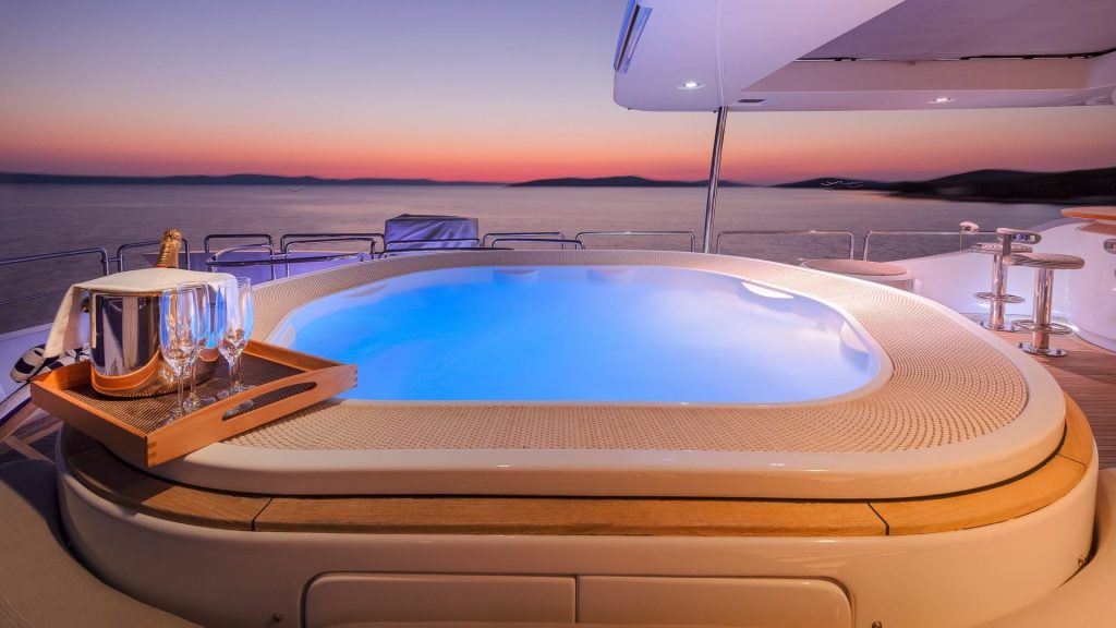 artemy yacht charter jacuzzi at sunset