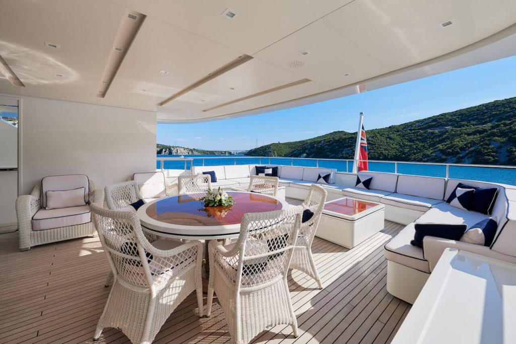 reve d'or yacht charter deck table