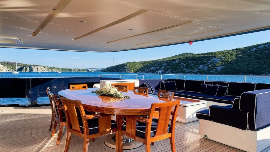 reve dor yacht charter upper deck aft dining table