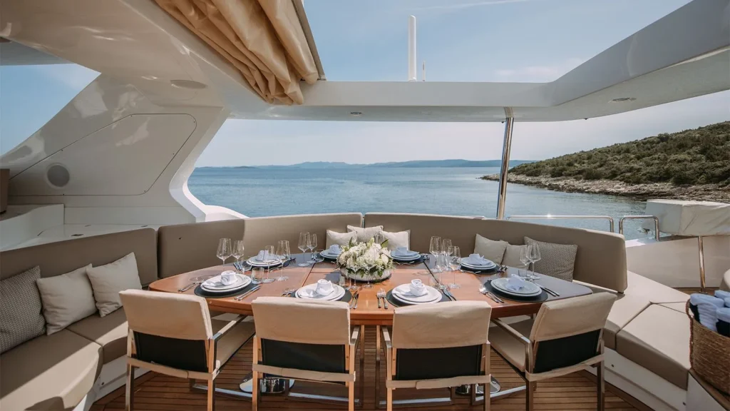 artemy yacht charter sundeck dining table