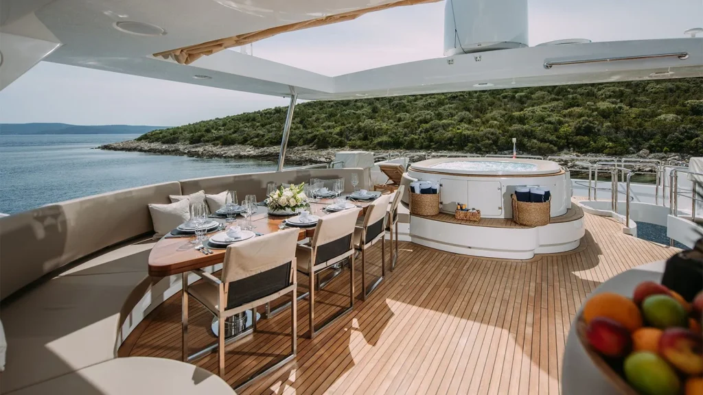 artemy yacht charter sundeck dining table & jacuzzi