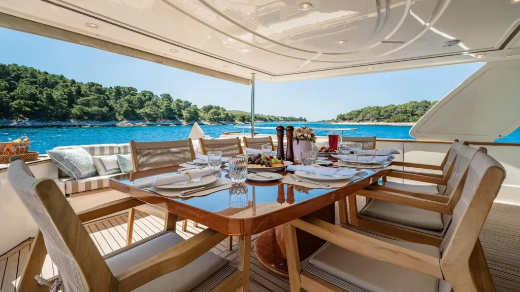 imagine yacht charter aft deck dining table