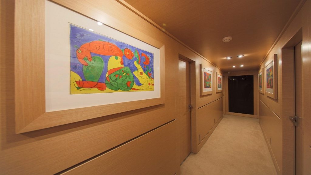 aiaxaia yacht charter corridor with painting