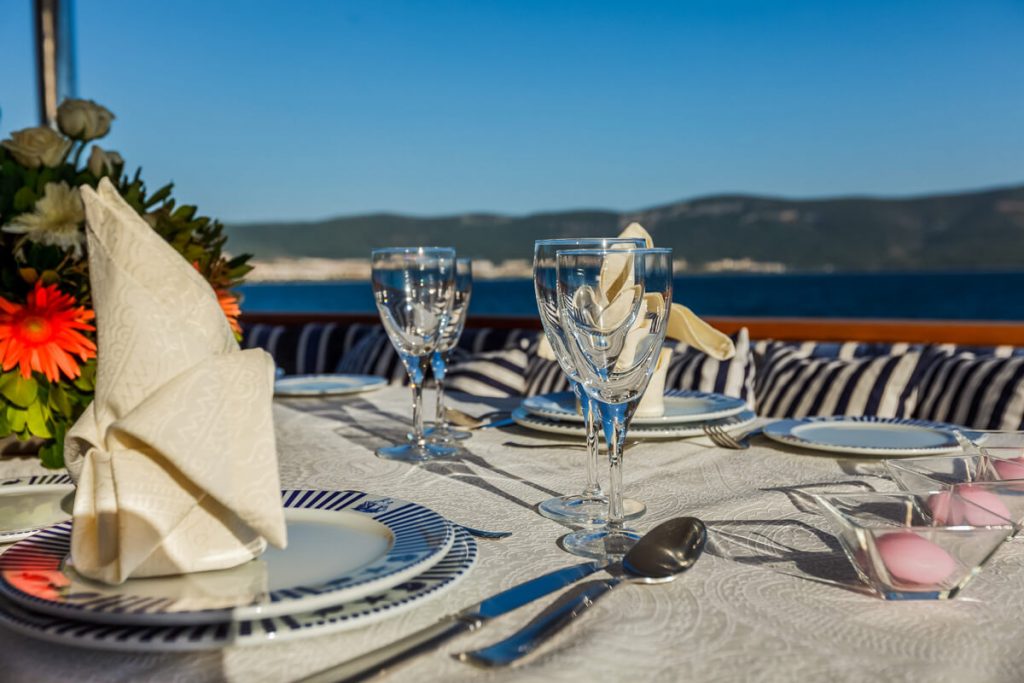 table setting on a yacht at the main deck