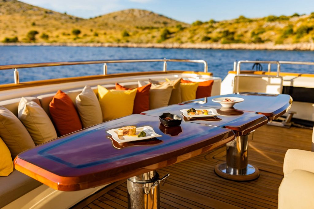 novela yacht charter aft deck dining area