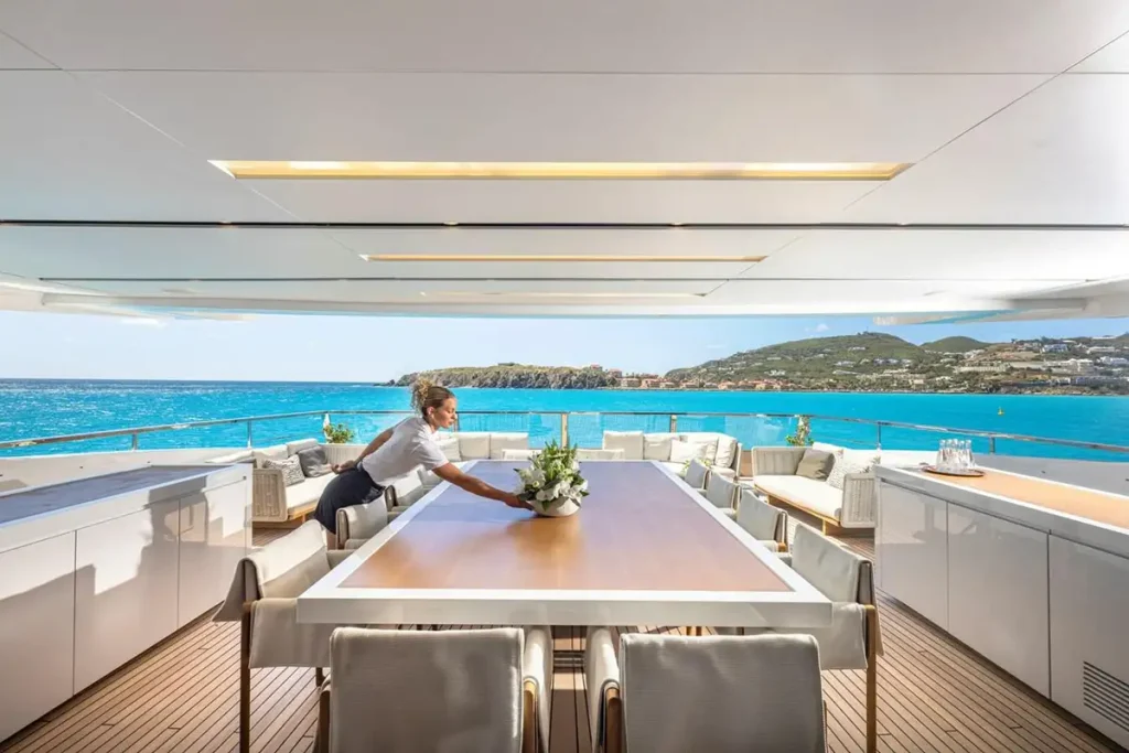 seven sins yacht charter upper deck dining area