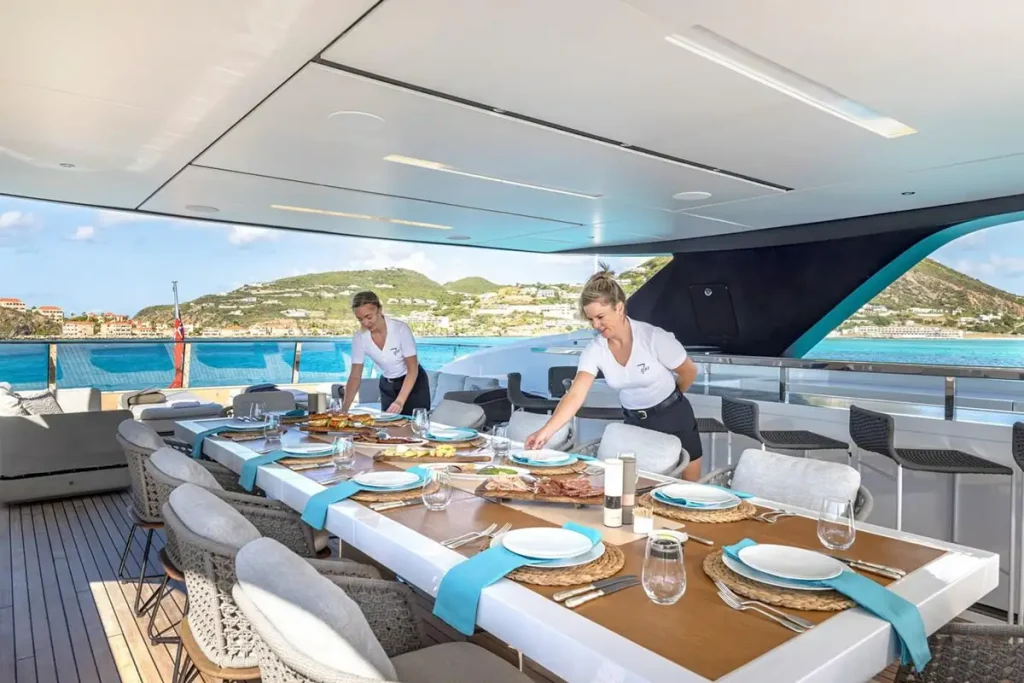 seven sins yacht charter upper deck dining set up
