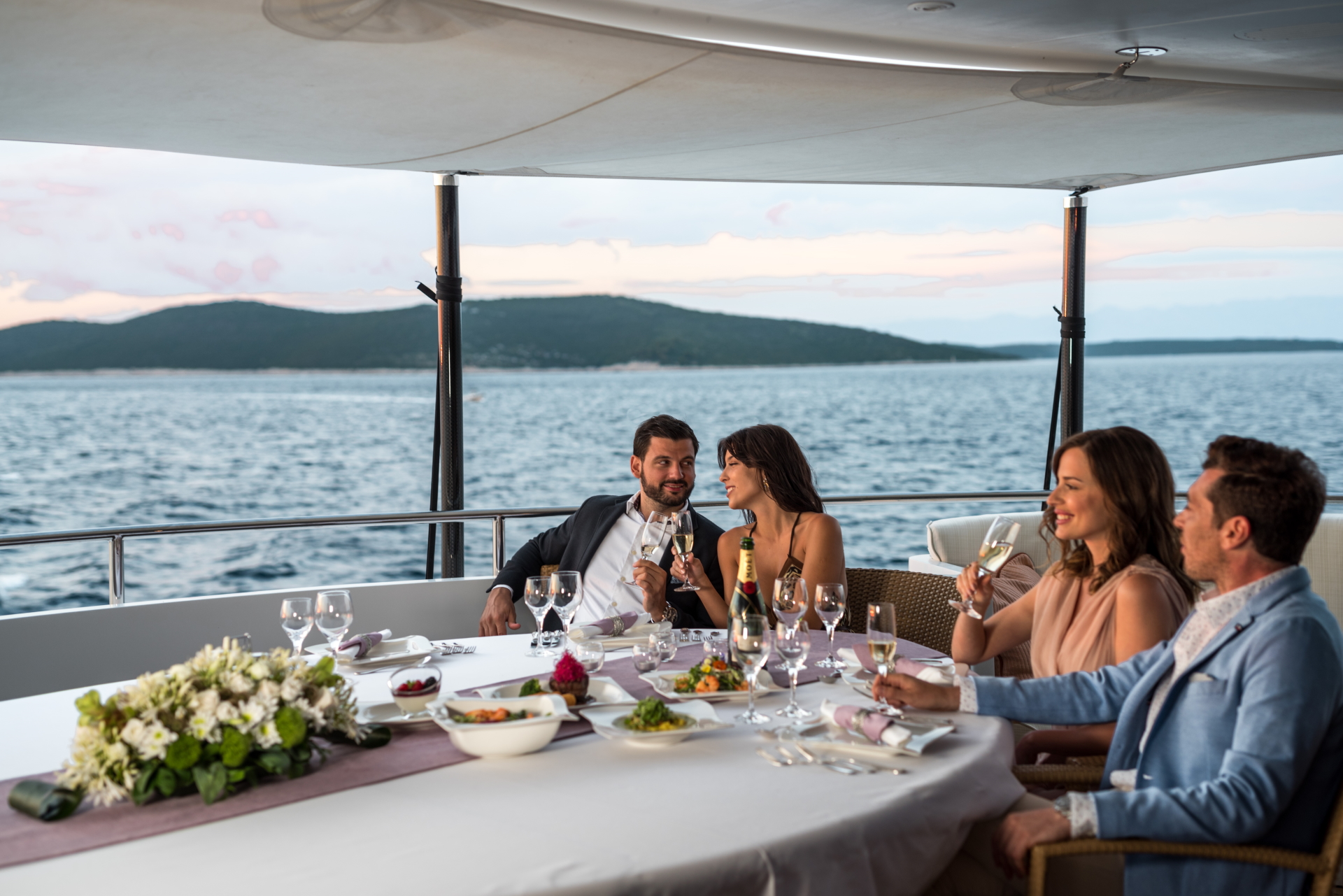 dine on a yacht guests dining