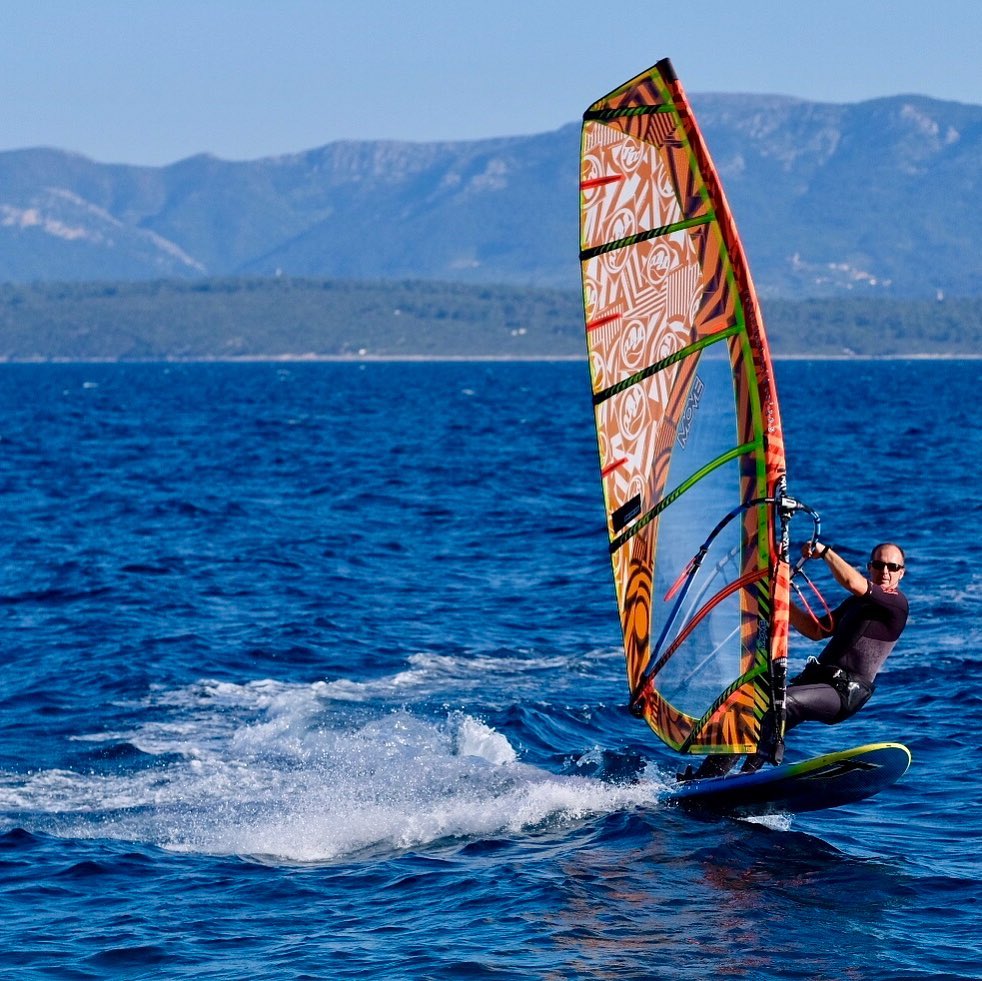 man windsurfing in croatia near bol on brač
