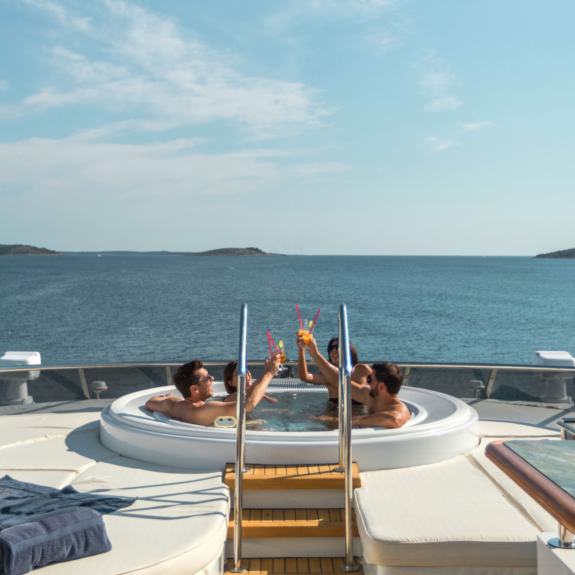 superyacht cocktails people in a yacht jacuzzi