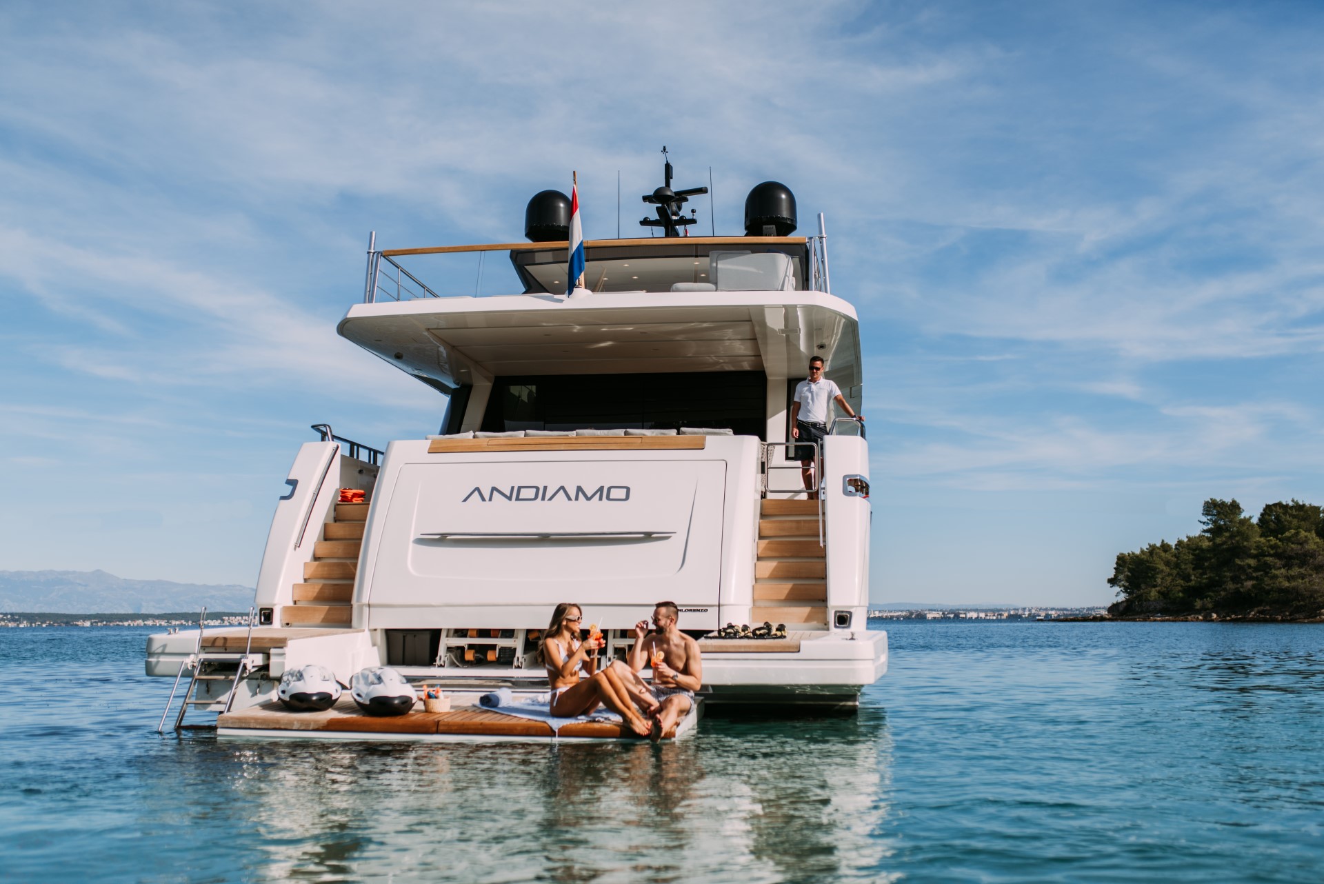 andiamo yacht charter guests on swimming platform Hydraulics on yachts