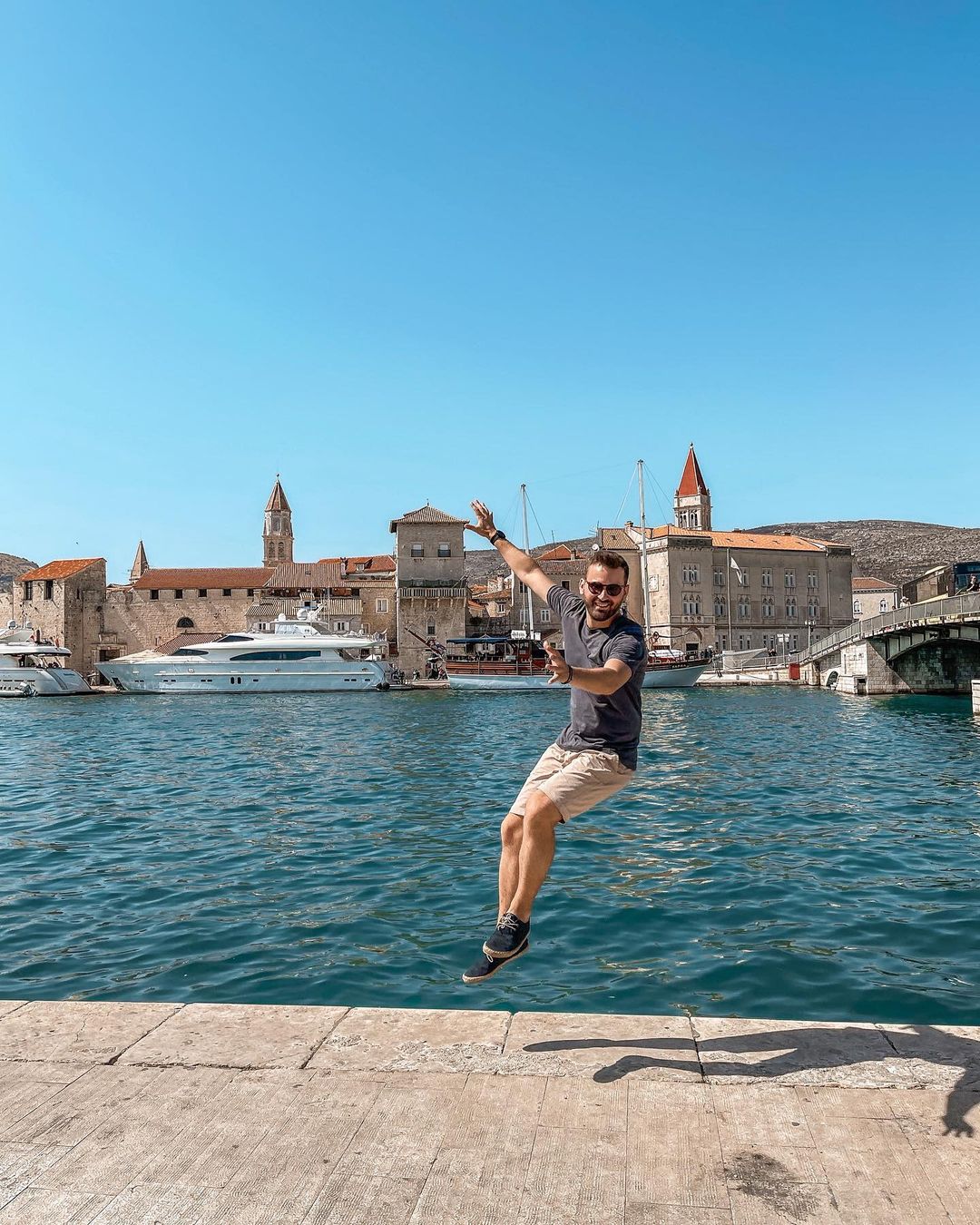 Yacht charter in Trogir person in trogir promenade