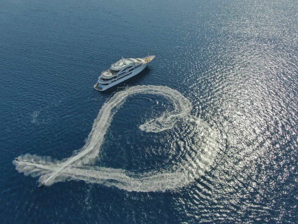anthea yacht charter aerial view jet ski making a heart shape