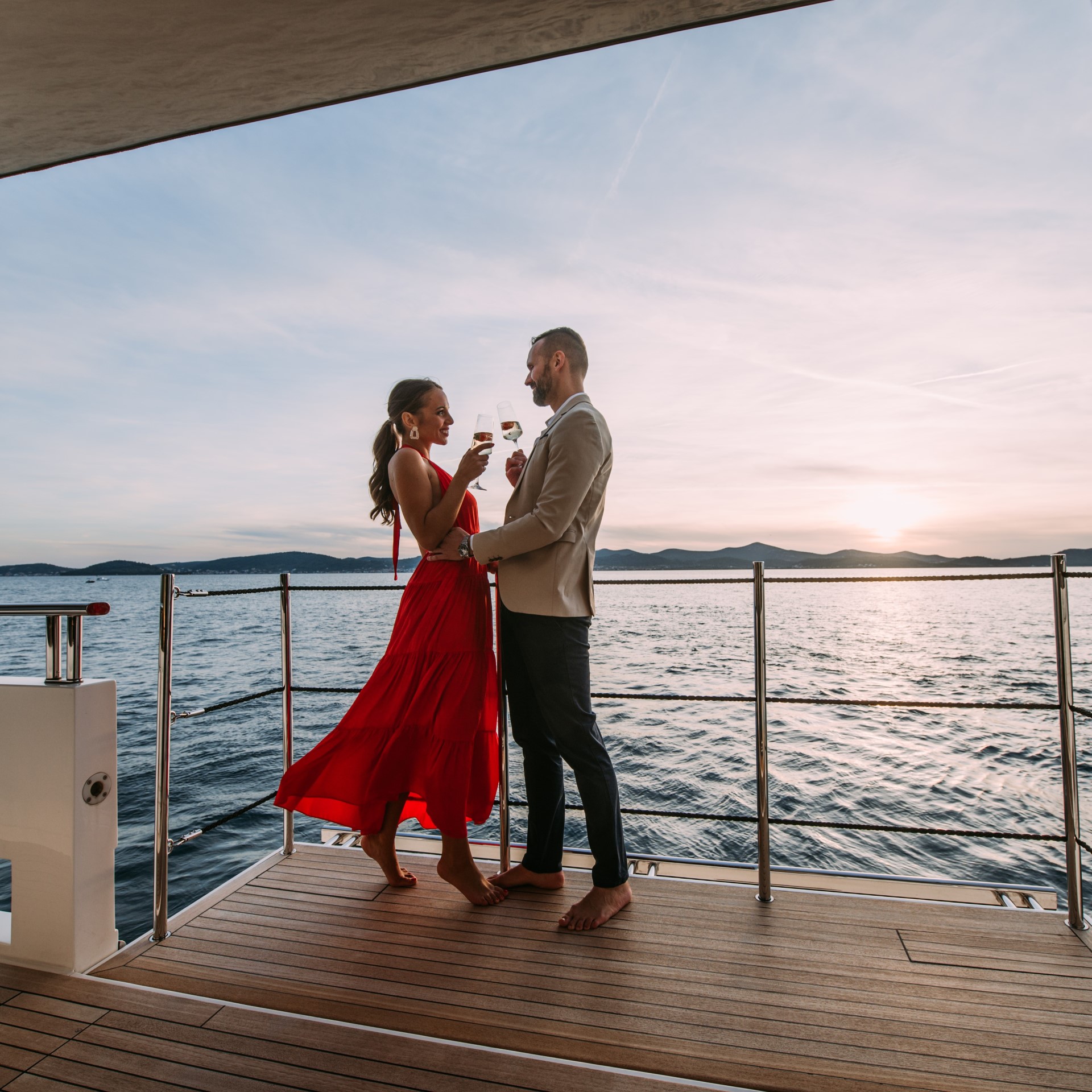 couple on a yacht balcony romantic yacht charter